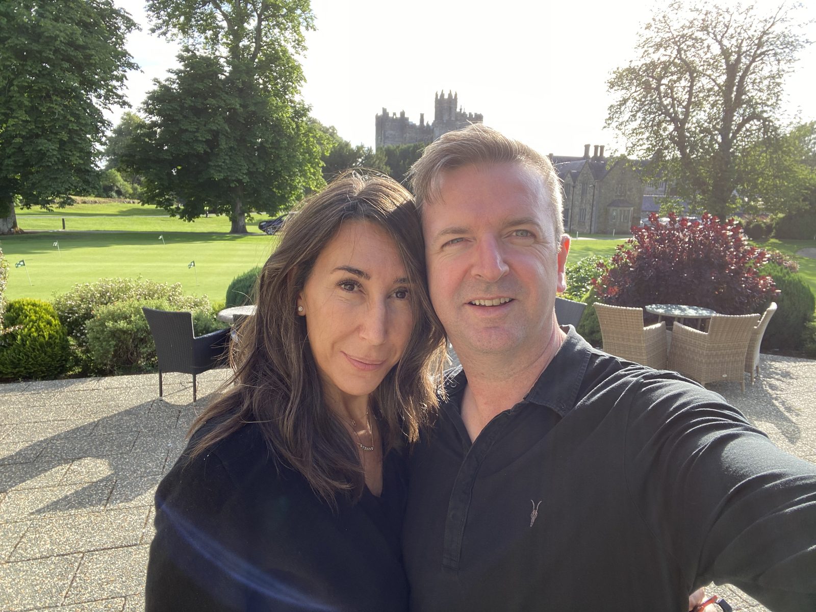 Cristina and Joe in front of a castle